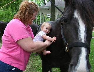 Even young ones love the horses